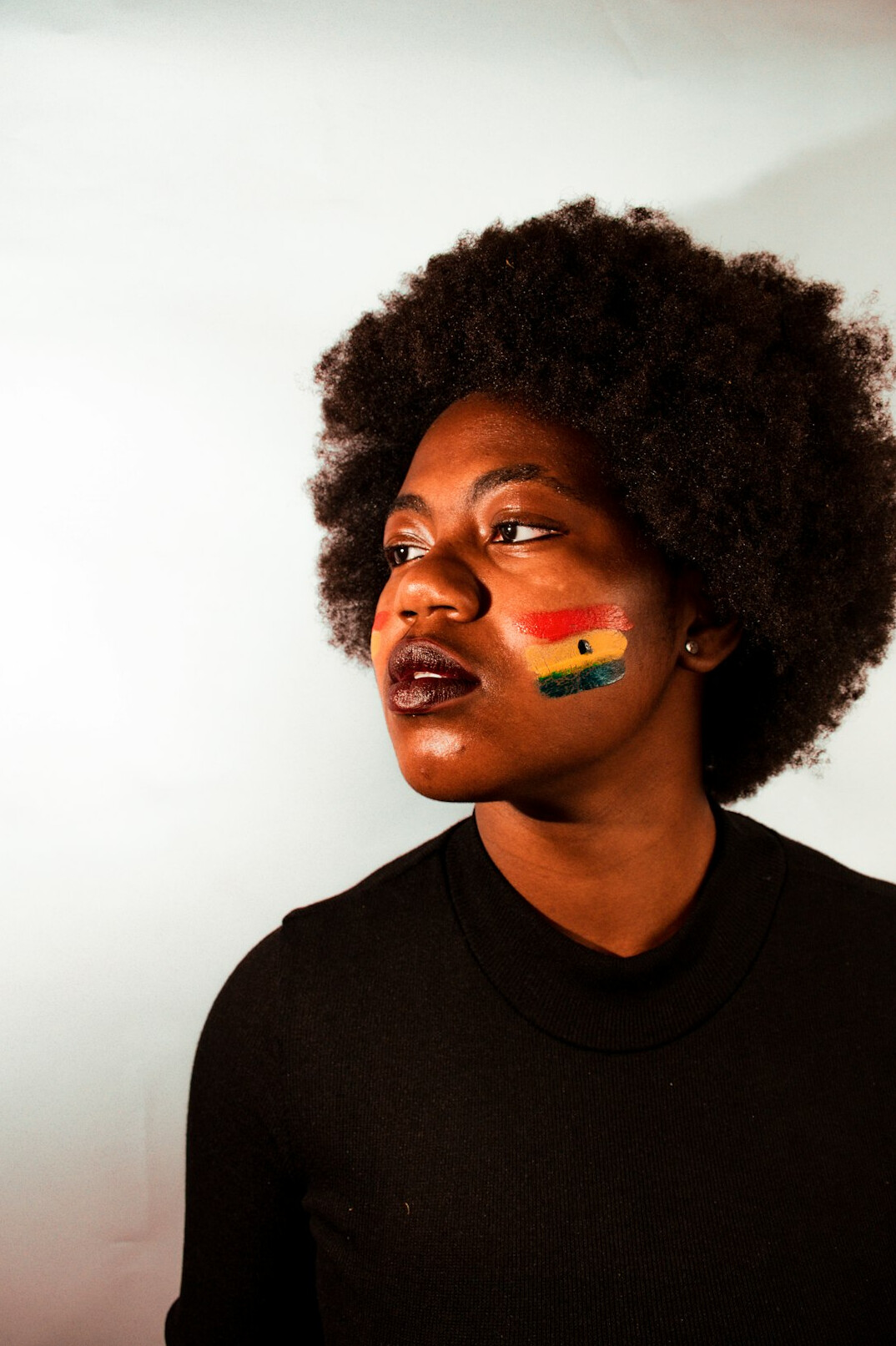Studio portrait of an Afro-Brazilian woman smiling