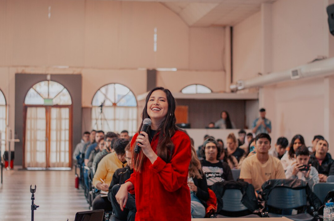 confident speaker presenting ideas