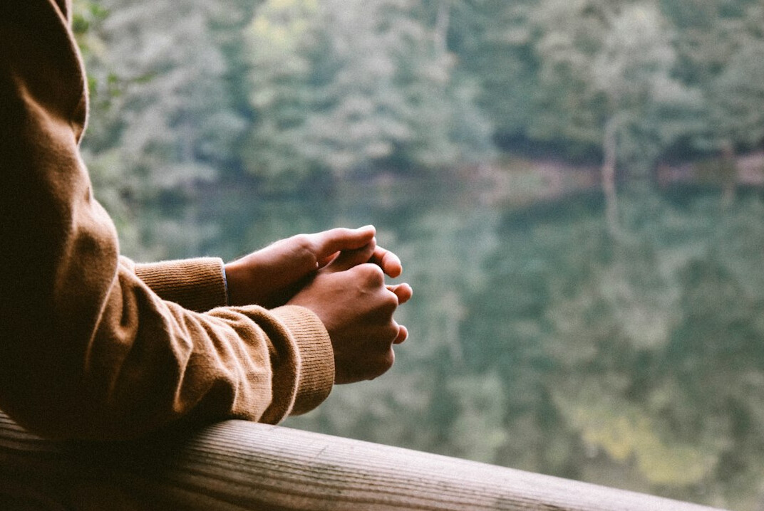 person reflecting on ideas