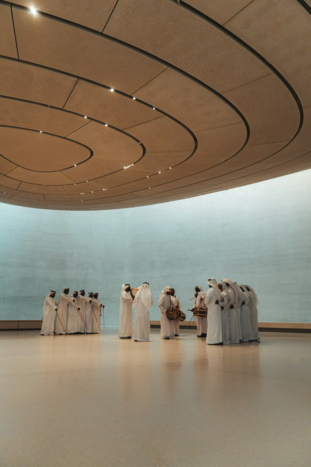 Group of people in a respectful group discussion indoors